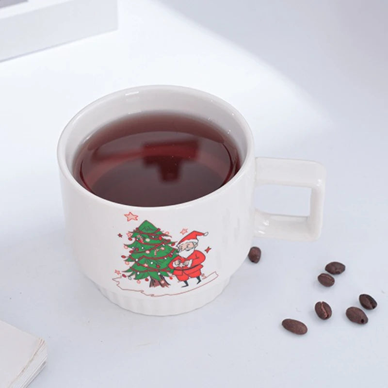 Christmas Ceramic Mug with Spoon & Rabbit Doll – Original Santa Claus Coffee Cup, Creative Holiday Gift

Add festive charm to your mornings with this Christmas Ceramic Mug, featuring an adorable Santa Claus design and a cut